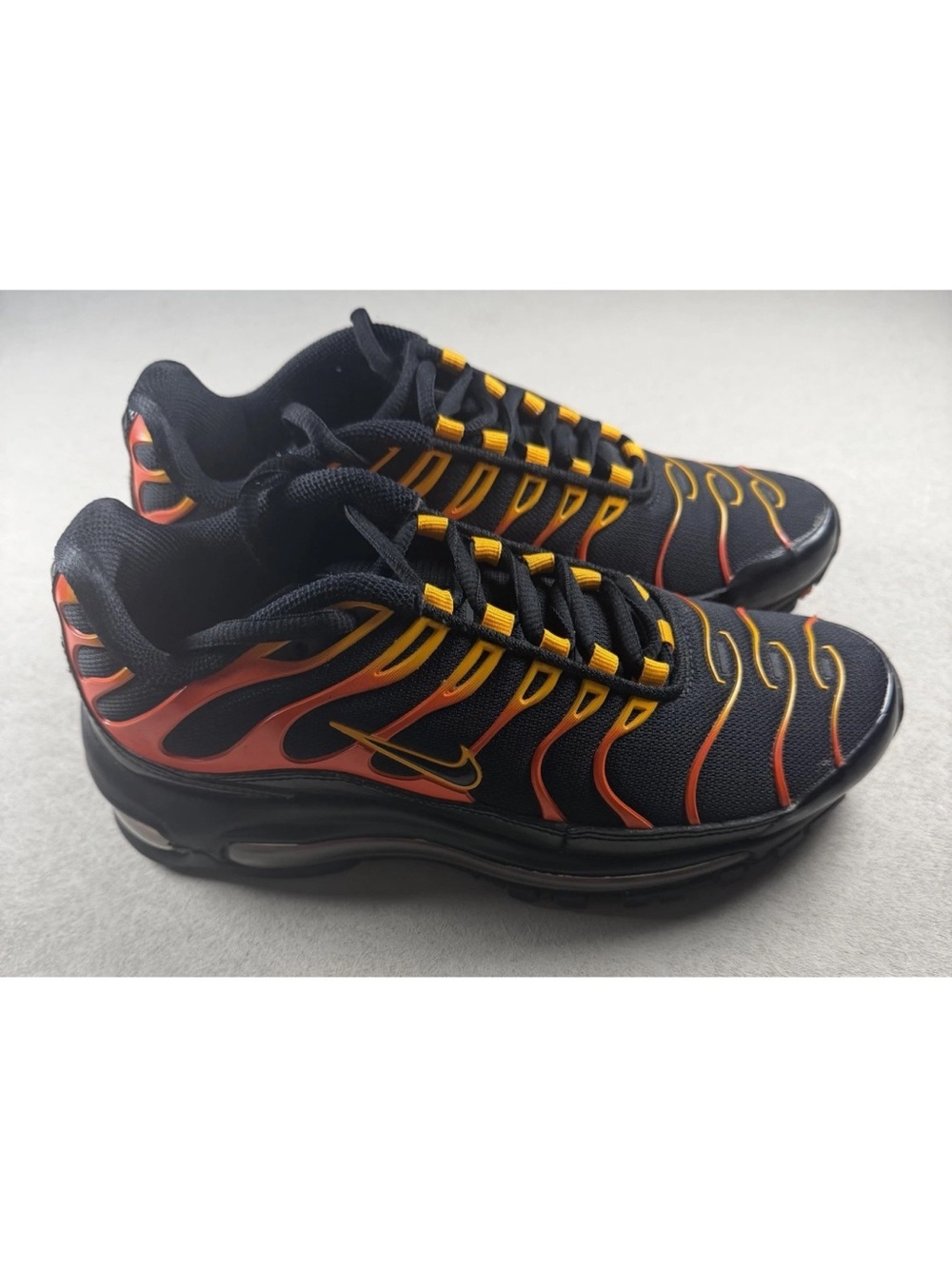 Nike Men's Black Running Sneakers with Orange and Yellow Flame Trim excellent